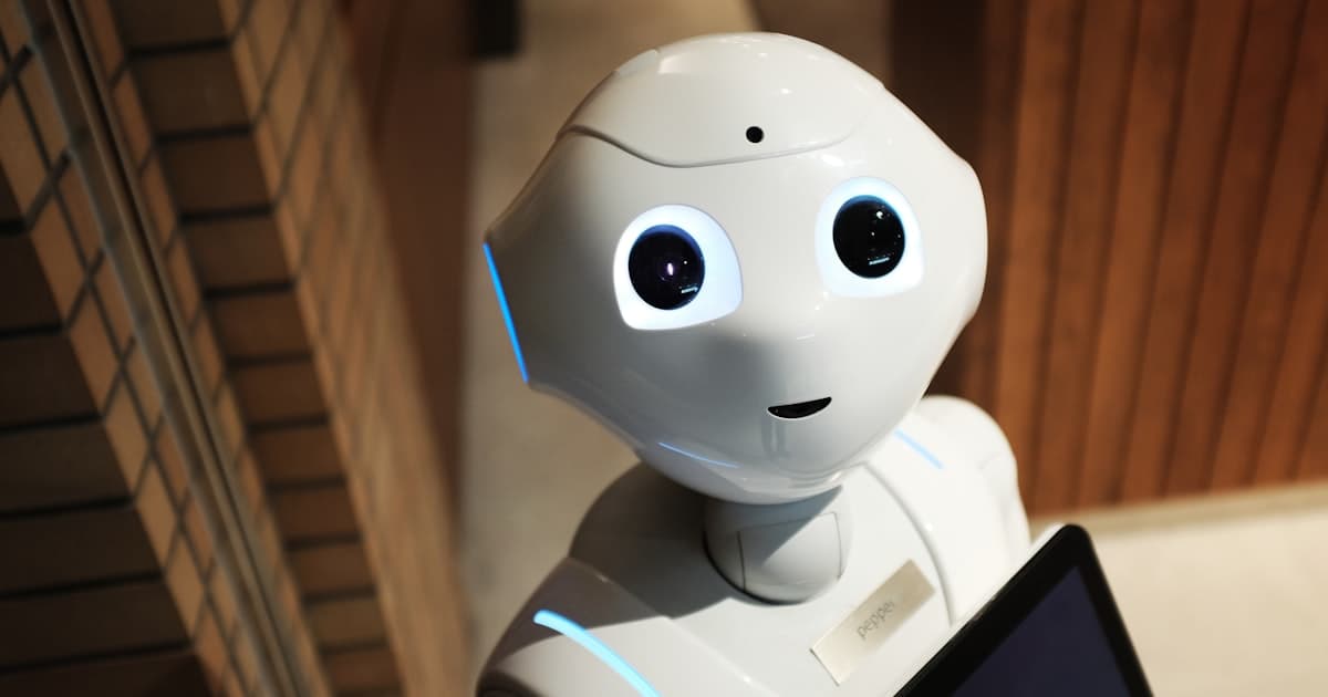 AI in marketing agencies concept showing human and AI collaboration on a marketing campaign dashboard